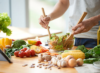 person preparing food in the kitchen'